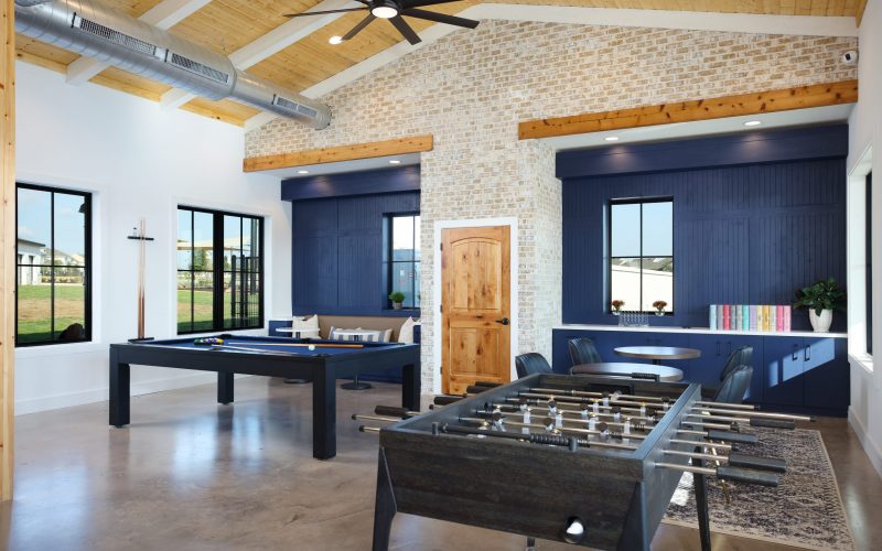 An image of the amenity city at Harvest Ridge in Elgin with a fooseball table and other furniture